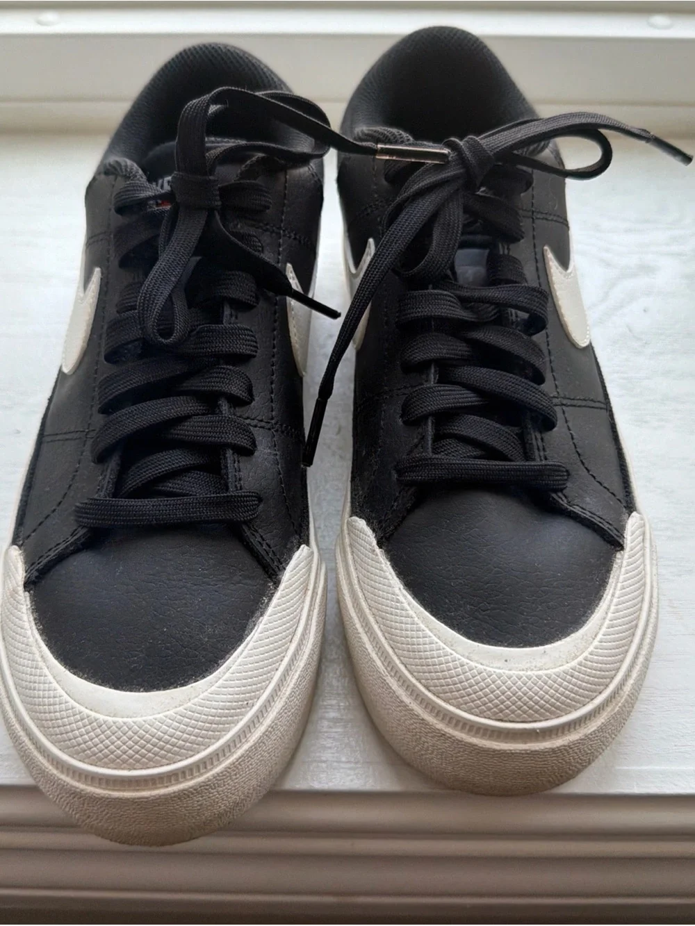 Nike Black Sneakers with White Swoosh